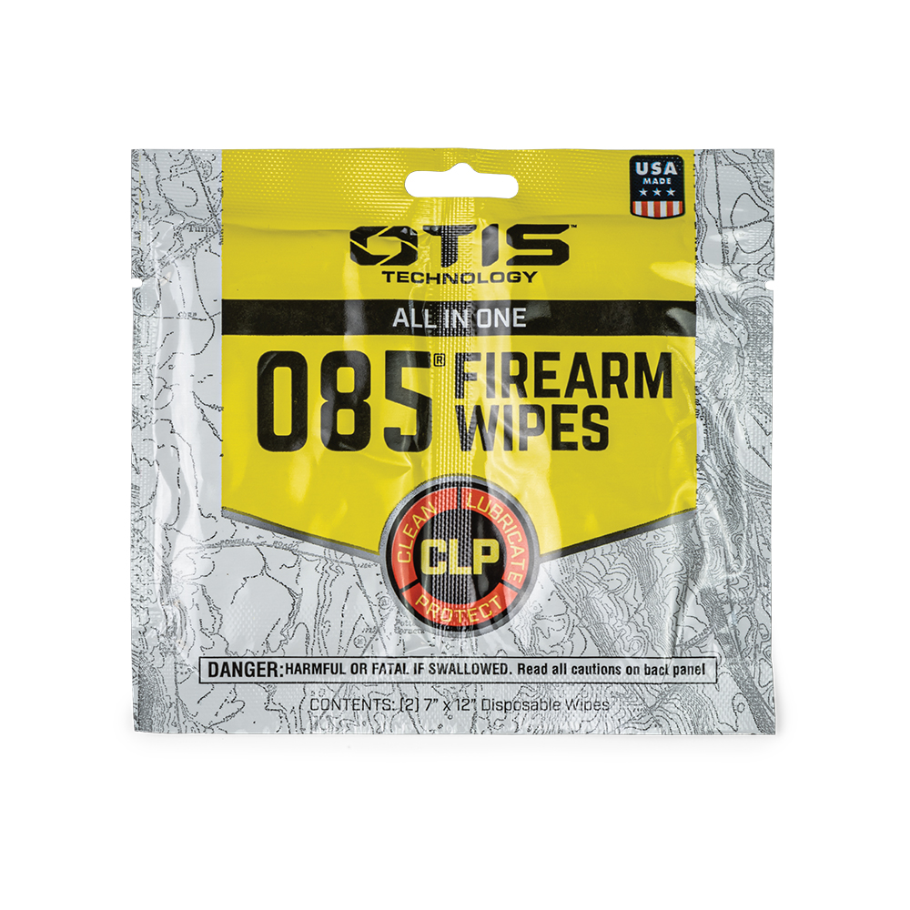 Gelbe Verpackung mit "085 Firearm Wipes"-Aufschrift, USA-Flagge, umgeben von grauem Muster.